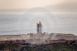 View of cement factory near the sea in Malaga city