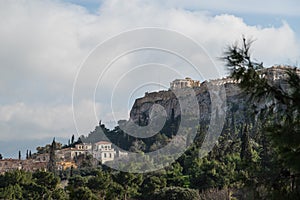 View of the center of Athens and the Acropolis on a background of trees