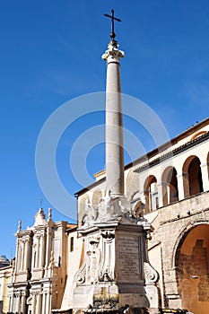 Corso Vittorio Emanuele and the fountain in the medieval town of Tarquinia in Italy photo