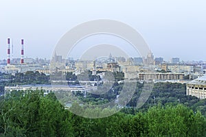 View of central Moscow from Sparrow Hills or Vorobyovy Gory observation viewing platform at sunset. Russia