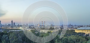 View of central Moscow from Sparrow Hills or Vorobyovy Gory observation viewing platform at sunset. Russia