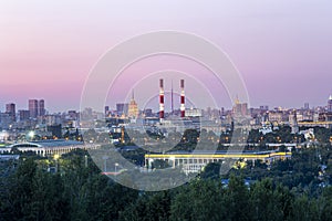 View of central Moscow from Sparrow Hills or Vorobyovy Gory observation viewing platform at sunset. Russia