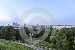 View of central Moscow from Sparrow Hills or Vorobyovy Gory observation viewing platform at sunset. Russia