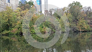 View of Central Park in New York taken in the Autumn, with Manhattan skyline