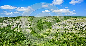 View from Cerven Fortress Bulgaria - green mountains and blue sky - cetatea Cerven