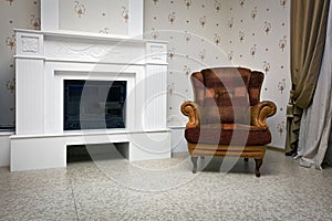 View of chair and fireplace