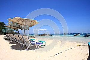 View of chairs and umbrella on the beach