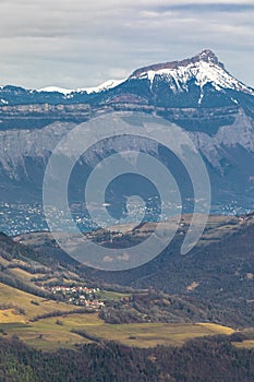 View of the Chamechaude peak in the Chratreuse mountains from the Belledonne moutains, Isere, France