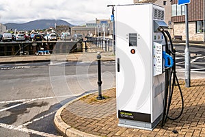 View of a charger for electric cars along a harbourside street