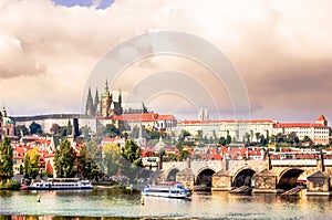 View on Charles Bridge over Vltava and cityscape in Praha