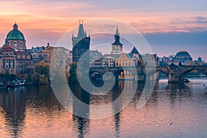 View of Charles Bridge in Prague during sunrise, Czech Republic. The world famous Prague landmark