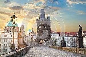 View of Charles Bridge in Prague during sunset, Czech Republic. The world famous Prague landmark.