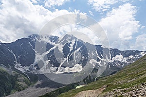 View of Cheget mountain in Caucasus with famous glaicer calles Seven, photo