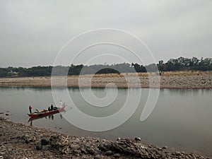 view of the Chenab river in Akhnoor where boating is a popular activity