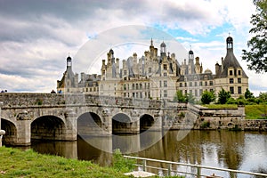 View of the Chenonceau Castle in village Chenonceaux, France with its reflection in the river Sher