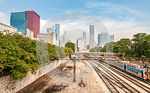 View of Chicago Downtown Skyline with railroad yard under bridge, USA