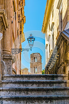 View of chiesa santa maria dell ammiraglio through a narrow street in Palermo, Sicily, Italy photo