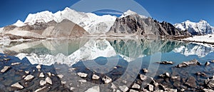 View of Cho Oyu mirroring in lake photo