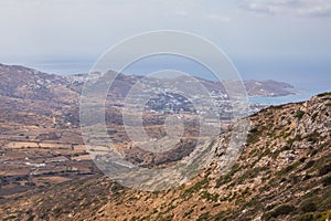 View of the Chora and port at Aegean Sea, Ios Island, Greece