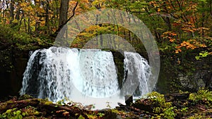 View of Choshi Otaki Waterfalls in the beautiful coloriful autumn forest