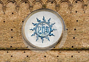 Christogram at Palazzo Publico in Siena, Italy photo