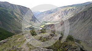 View of the Chulyshman valley from the Katu-Yaryk pass in Altai. Summer trip to the Altai Republic in Russia