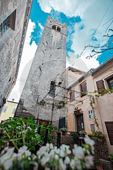 View of a church and bell tower in the medieval village of Motov