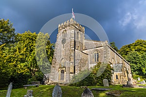 A view of the church at Clapham at the foot of Ingleborough, Yorkshire, UK photo