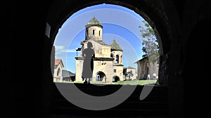 View of the Church through the dark archway