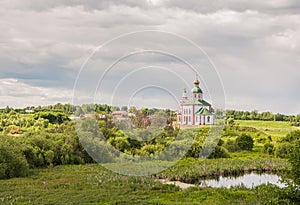 View of the Church of Elijah the Prophet on Ivanova mountain before the storm in Suzdal