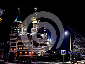 view of the church on a frosty winter night