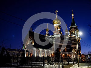 view of the church on a frosty winter night