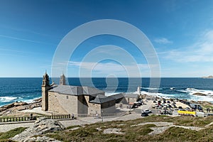 View of the church in Muxia, A Coruna, the Atlantic ocean on the background