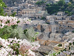 View from Church of San Giorgio, Modica with pink bougainvillea,Sicily