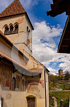 View from church St. Peter with romanesque frescoes to Tyrol Castle, Dorf Tirol, South Tyrol, Italy