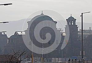 View of church `Staint Nedelya` with fine particulate matter air in the city and PM 2.5 dust, and air pollution in Sofia, Bulgaria