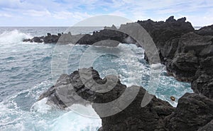 A View of Churning Waves and Spray at the Sea Arches, Waianapanapa State Park