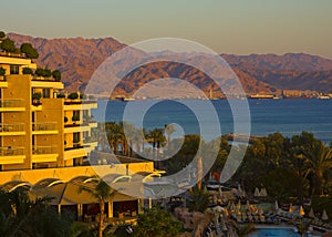 View of the cities of Eilat in Israel and Aqaba in Jordan at sunset