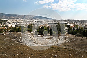 View of city of Athens from Acropolis city arena in front.