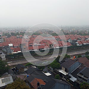view of the city of Bandung during drizzling weather
