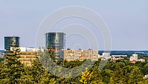 View on the city buildings from the forest of apeldoorn, popular dutch city, The netherlands