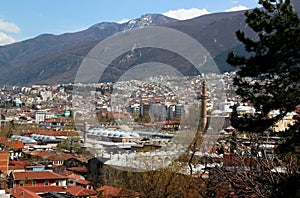 A view of the city of Bursa with many mosques, hans and Uludag mountain in the background