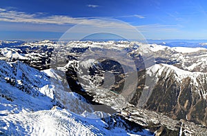 View of the city of Chamonix seen from the Aiguille du Midi. French Alps, Europe.