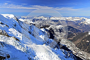 View of the city of Chamonix seen from the Aiguille du Midi. French Alps, Europe.