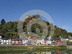 View on the city Cochem in Germany from the Moselle river with the Reichsburg castle in the background
