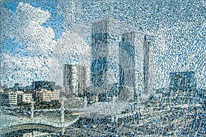 View of a city through cracked glass