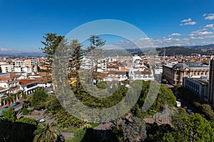 View of the city of Cuenca, Ecuador, with it`s many churches at sunny summer day. South America