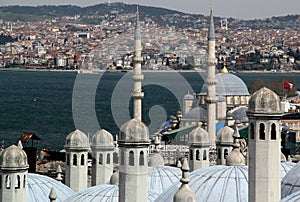 View of the city of Istanbul with the waters of the Bosphorus, the Maiden Tower and towers of Suleymaniye Mosque
