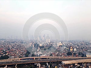 View of the city of Jakarta with bridges and panoramas of residents` houses