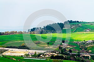 the view of the city from the mountains, the Italian house at the foot of the mountains, town between mountains, panoramic landsca